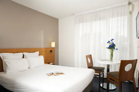 Séjours & Affaires Paris-Nanterre Отели рядом с достопримечательностью «Университет Париж Нантер»