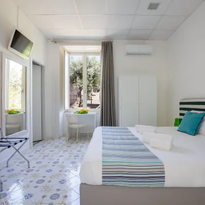 โรงแรมสไปซี่ โรงแรมใกล้หาด Spiaggia Sorrento