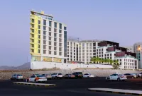 Grand Millennium Muscat connected to Muscat Grand Mall - parking