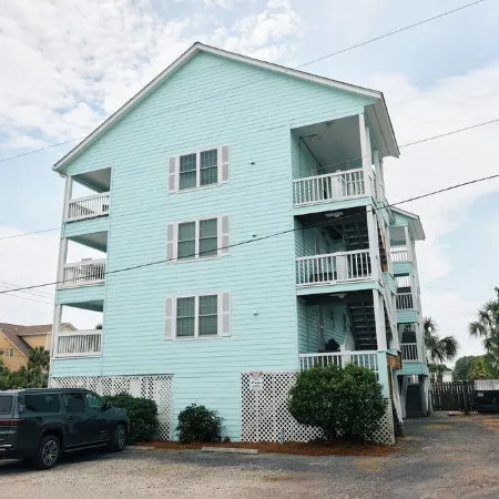 Top Floor Surfside Beach Condo with Pool & Easy Beach Access, Pets Welcome