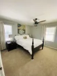 Updated 4-bedroom house with relaxing sunroom; minutes from downtown Raleigh.