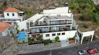 Guesthouse-TheView فنادق في Canhas