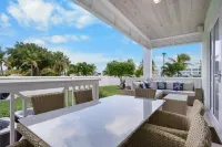Luxury Beach side escape, steps from private beach, restaurant, marina, and café
