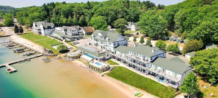 Portage Lake Condo w/ Deck & Pool Access! Hotels in Manistee County