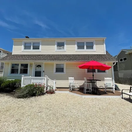 1st Fl of duplex. Sunsets over the bay, walk to beach. Great family getaway.