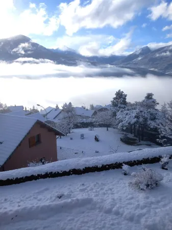 Spacious apartment with magnificent view and terrace, on the 1st floor of a villa.