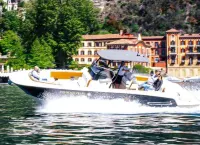 From the apartment and terrace view of the Lake, and with private parking space