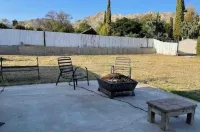 Cheerful 6 bedroom home with indoor fireplace.