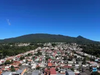 Penthouse with Volcano Views & Top Amenities - AC, Gym, Lounge, Patio, Workspace