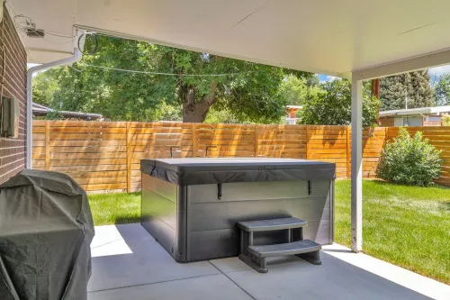 Newly remodeled 5-bedroom house  1.8 mi to Old Town Arvada  Hot Tub, AC