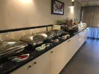 Cattlemans Country Motor Inn & Serviced Apartments - breakfast