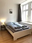 Vacation apartment with balcony overlooking the spa gardens of Bad Rothenfelde