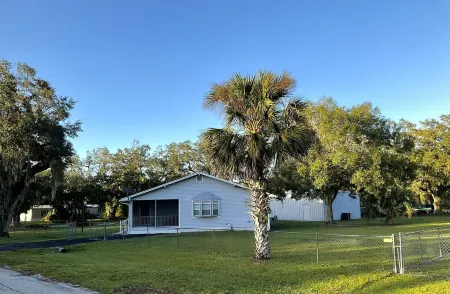 Green Acres! - Spacious secure home with ample boat parking for fishing & fun!