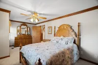 Country living at its best, chickens and a beautiful stocked pond to fish in