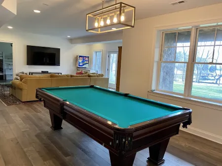 Large Lux Waterfront Home on 9 Acres with Sandy Beach and Beautiful Sunsets