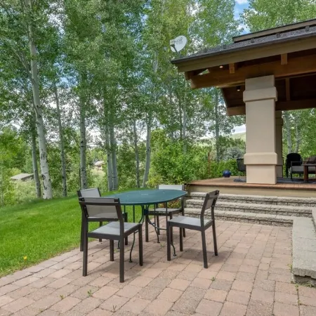 Ski bus stops at front door, court sports and indoor game room, bike path