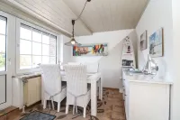 Tobi's Kajüte Freundliche Obergeschosswohnung in Norddeich für 4 Personen + Baby