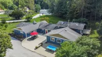 Family Friendly Retreat, sleeps 12+, Pole Barn with games, Large inground pool