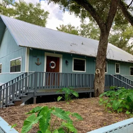 Rustic newly remodeled River House on working fish house property . Gulf access