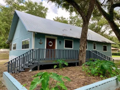 Rustic newly remodeled River House on working fish house property . Gulf access