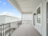 Coastal beach cottage steps away from the white sand beaches!