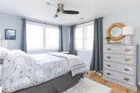 Classic Beach Cottage with front porch view of water
