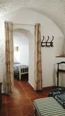 Cave in the most touristic neighborhood of caves in front of the viewpoint. Hotel a Comarca de Guadix