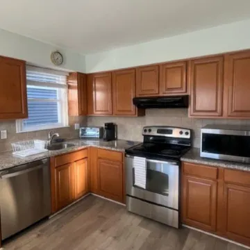 Cozy and quiet beach 1st floor condo just steps from the beach!