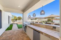 1+ Acre 5 Bedroom Desert Oasis with Pool and Mountain Views!