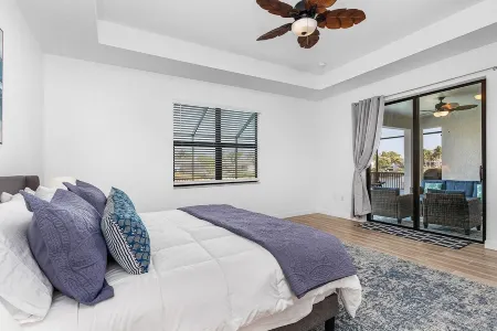 Great Location! 2,444 sq ft canal front villa with heated pool/spa.