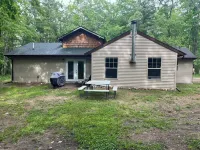 Cabin in the Woods, 10 Acres, Sleeps 8. Close to Orv Trails and Forest Dunes.