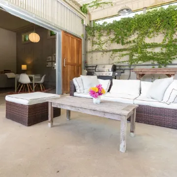 Newly Renovated Former Cider House with outdoor covered patio and gas grill.