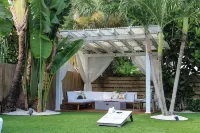 A beautifully renovated private home with a large backyard, Pool, and Hot Tub