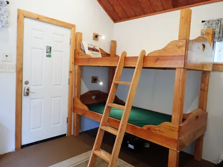 Cabin and adjacent tent site