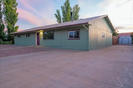 Modern retreat with games room in central location!