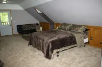 Northwoods Get Away!  Enjoy the privacy of this property & large game room!