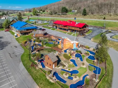 Lake Front Home w/ Hot Tub, Fire pit, yard, walk to Wisp Resort,Tubing Hill View