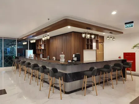 Unhas Hotel & Convention Отели в г. Тамаланреа