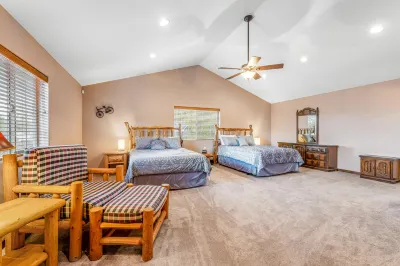 Spacious lakefront home with deck, private dock, four fireplaces, & W/D