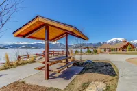 Lakefront Condo with Mountain Views & Shared Hot Tub - Walk to Town & Ski Access