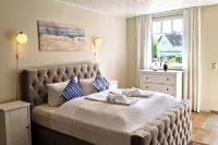 Schwedenhaus in der Hotelanlage Tarnewitzer Hof Hôtels à : Ostseebad Boltenhagen