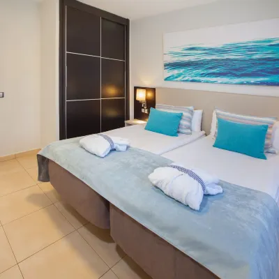 Grupotel Playa Feliz Hotels near Sioux City Park | San Agustín