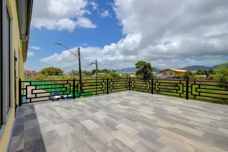 Airport Suites Hotel Отели в г. Tunapuna