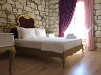 Alacati Alaris Hotel - سرير ووجبة إفطار
