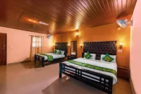 Treebo River View Resort Отели в г. Канданаколли