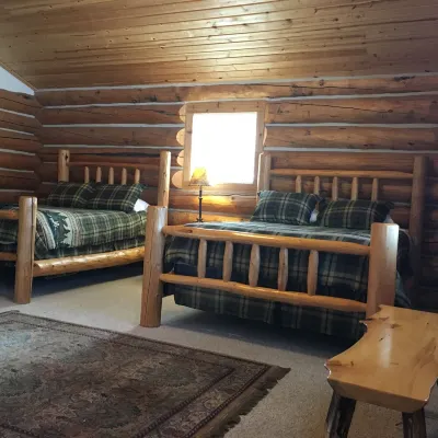 “Deer” Log Cabin with 2Q Log Beds, Bath and Kitchenette