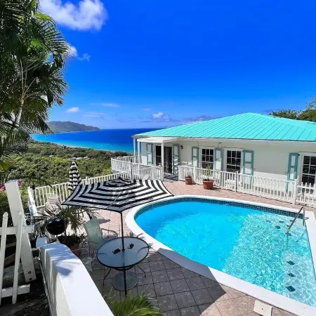 Quiet hillside villa with expansive sea, beach, and mountain views...