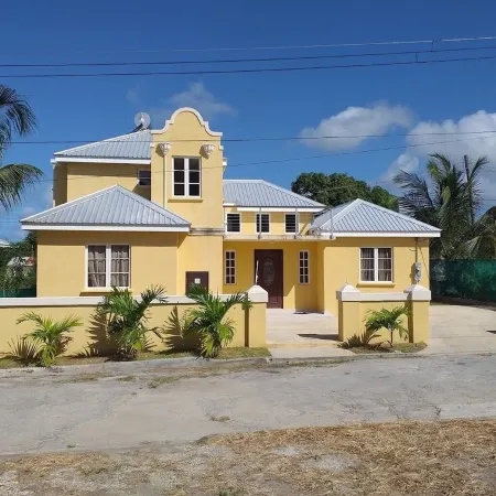 A modern and spacious house, steps to the beach with a private pool!!