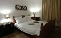 Grand Appartement de 75m2, 2 Chambres et Jardin
