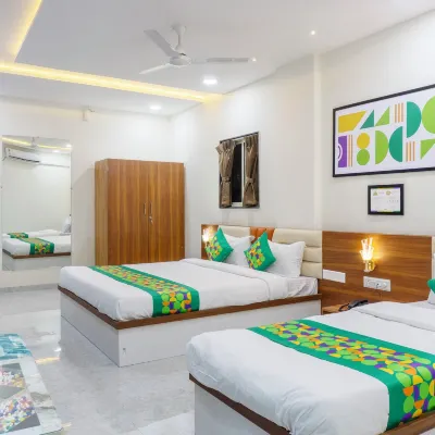 Treebo Aura Inn Regency Hotels near Ambika Mangal Karyalay, Shiroli